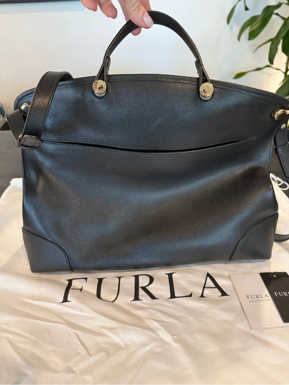 Furla downsizing figured